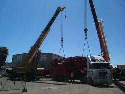 Machine with dual crane discharge from truck Perth Western Australia